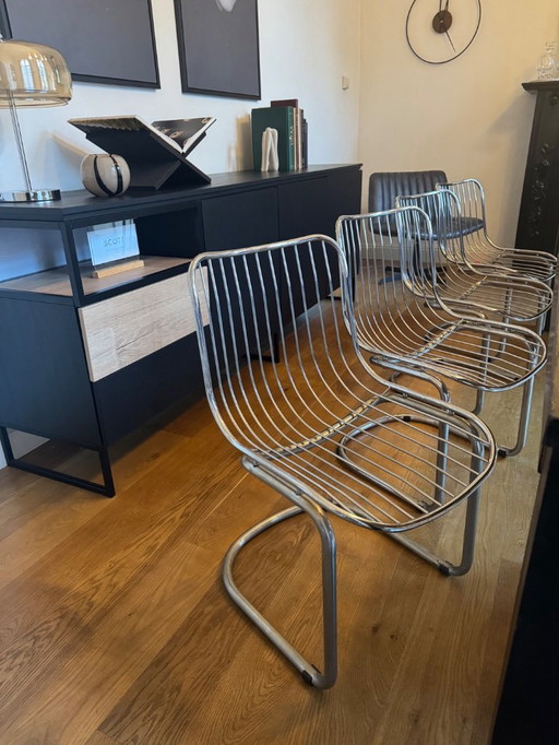 4x wire vintage sled chairs 