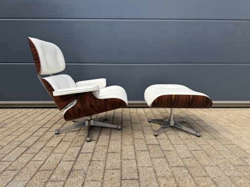 Poltrona lounge originale Vitra Eames + poggiapiedi Santos in palissandro e pelle bianca 10/10