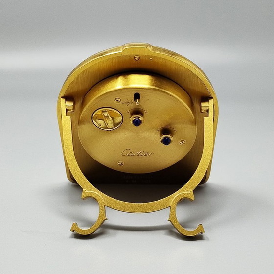 Image 1 of Cartier "Romane" reis- en bureauwekker uit de jaren 80, verguld met 18 karaats goud, inclusief originele doos en papieren.