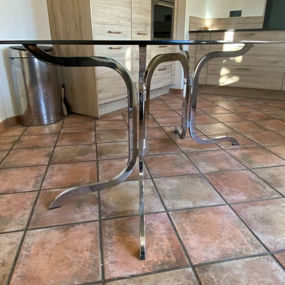 Image 1 of Tavolo Roche Bobois. 1970. Acciaio cromato. 175x94.