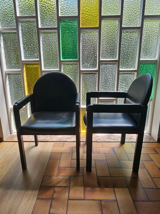 Image 1 of Ensemble de 6 (+2) chaises design Bulo – Cuir noir et bois – Années 1980
