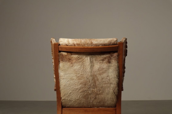 Brutalist oak lounge armchair and ottoman in original goat hide, 1960s – Wood (photo 6 of 15)