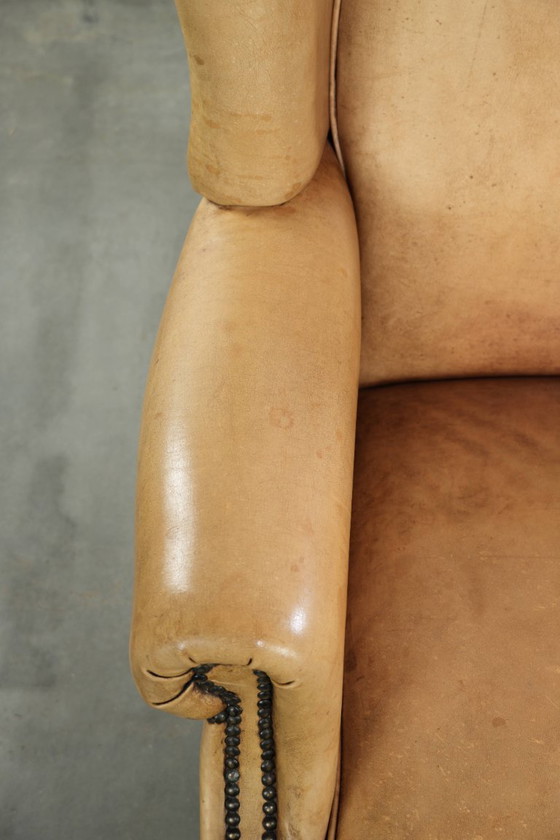 Image 1 of Lichte rundleren oorfauteuil met een goed zitcomfort