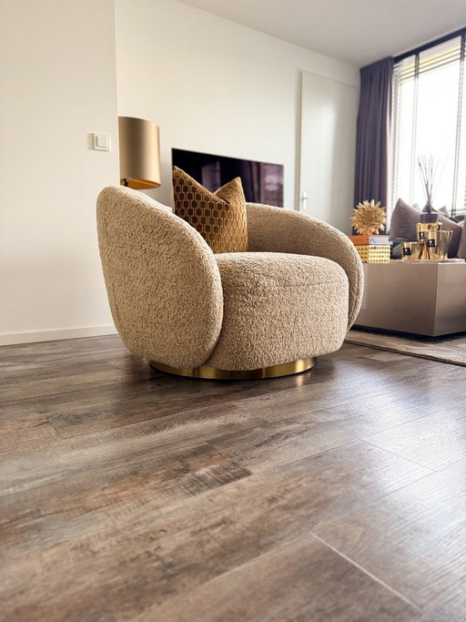Fauteuil pivotant Eichholtz Diego Canberra Sand