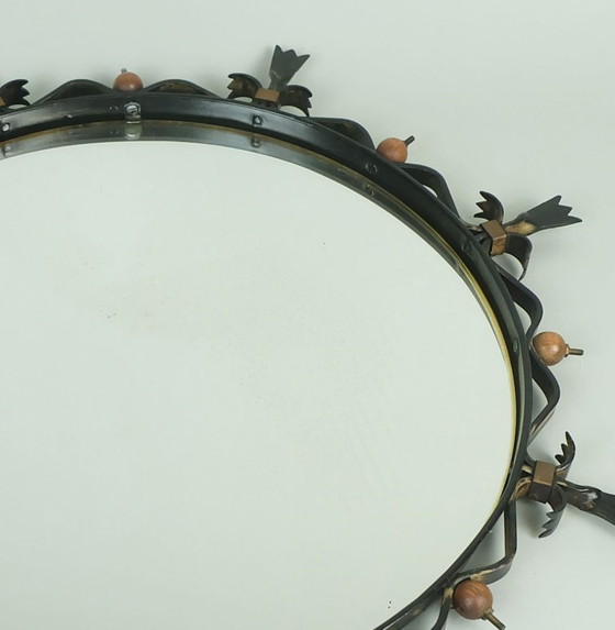 Image 1 of ronde mid century wandspiegel metalen lijst smeedijzer hout messing jaren 1950/60