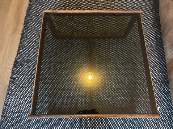 Image 1 of Vintage rosewood coffee table with smoked glass top