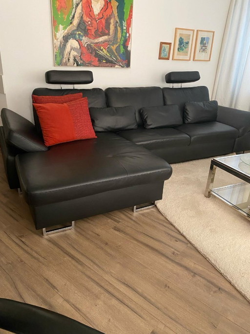 Très beau canapé d'angle en cuir noir