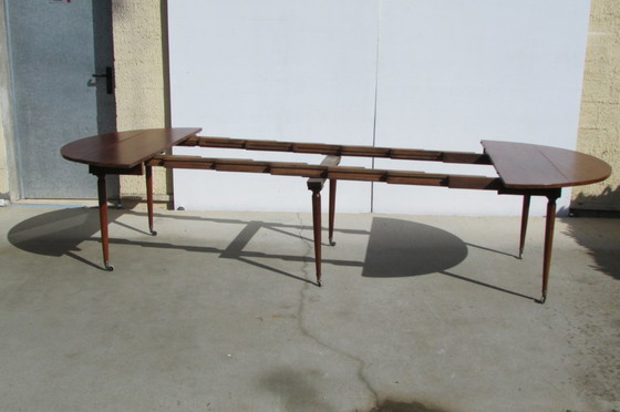 Image 1 of Beautiful antique round table, 6 tapered mahogany legs, extendable