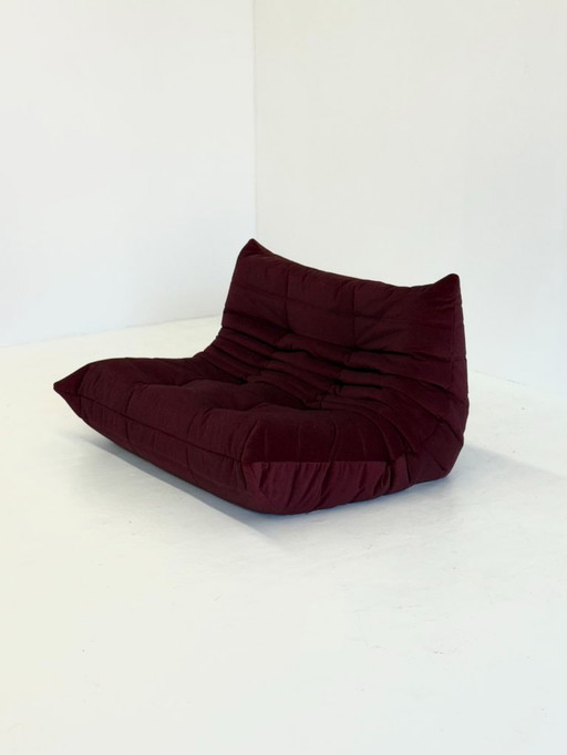 Ligne Roset Togo 2-seater in burgundy red velvet