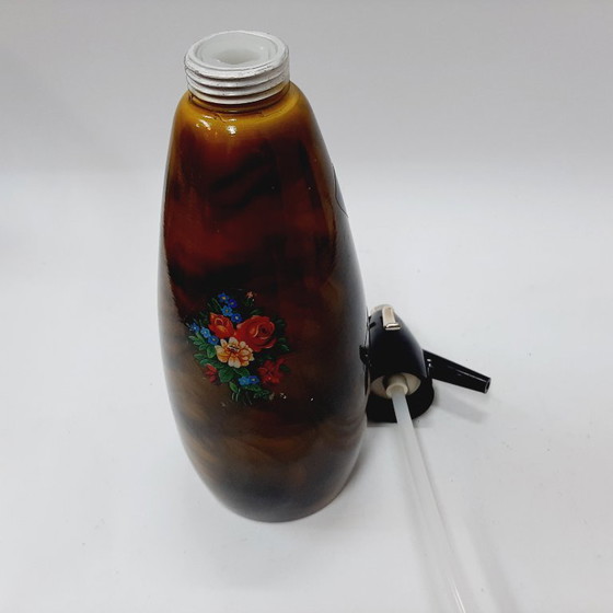 Image 1 of Vintage jaren 70 gele/bruine metalen frisdrankfles