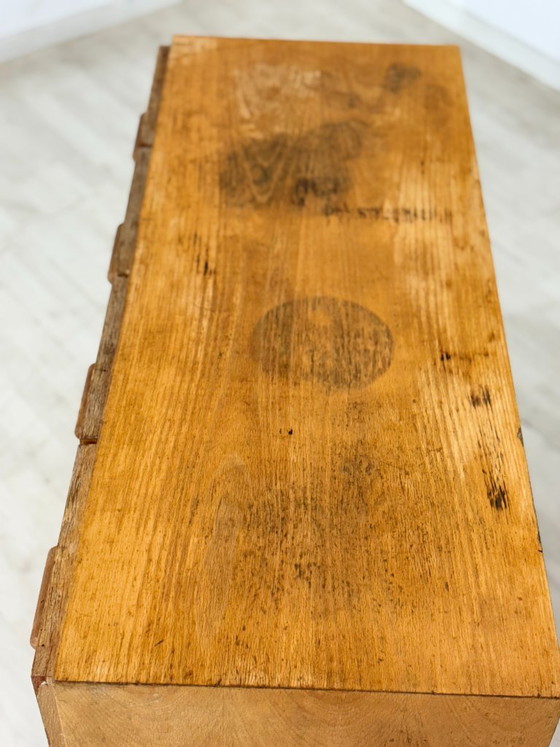 Image 1 of Beautiful vintage apothecary cabinet / compartment cabinet on casters – 16 compartments