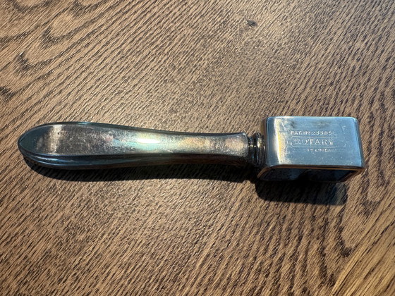 Image 1 of 1930/1940 silver rotary razor sharpener