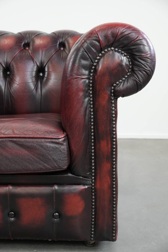 Image 1 of Englischer Chesterfield-Ledersessel auf Rollen, verziert mit Ziernieten