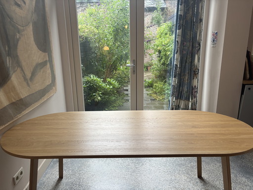 Due to move: Hay triangle leg lacquered oak dining table