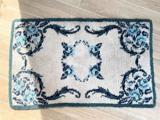 Alfombra azul de pura lana 125x78cm