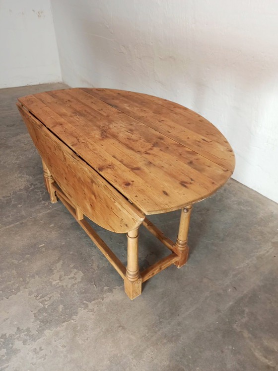 Image 1 of Vintage pine gateleg drop leaf dining table 