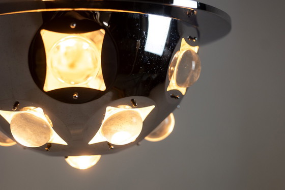 Image 1 of Oscar Torlasco. Satellite" chandelier in chromed metal. Circa 1970.