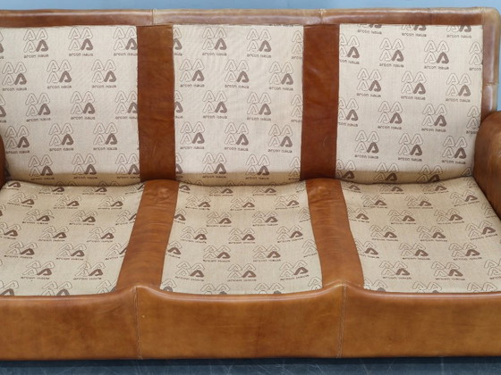 Image 1 of Arcon Italia driezitsbank uit de jaren 70, bekleed met cognacbruin buffelleer.