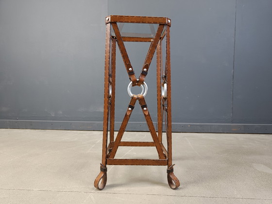 Image 1 of tavolino in ferro in ecopelle attribuito a jacques Adnet, anni '70