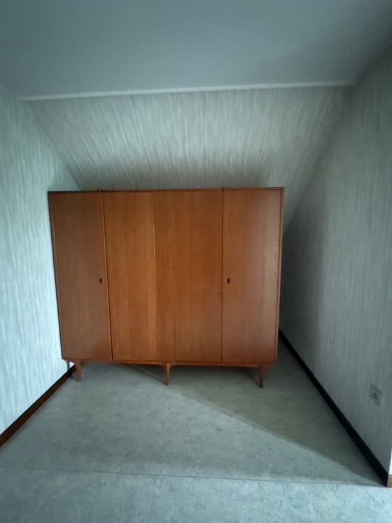 Image 1 of This cabinet is a rare vintage wardrobe