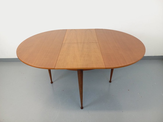 Image 1 of Vintage Scandinavian style round teak dining table from the 1950s/60s with extension