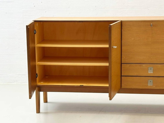 Image 1 of Dressoir uit het midden van de 20e eeuw met veel opbergruimte, gemaakt van beukenhout, jaren 60.