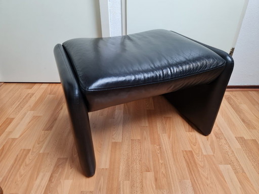 Poef hocker voetenbank Leolux zwart leer Bora
