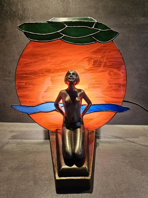 Art Deco lamp MCM 1960, probably bronze with Tiffany style glass shade.