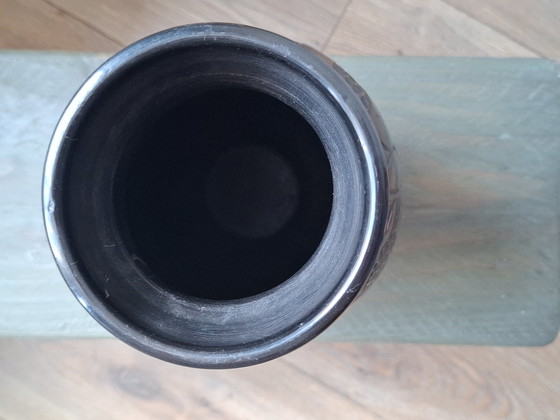 Image 1 of Tall black bakelite vase with unusual tulip decor, beautiful vintage object in very good and usable condition!
