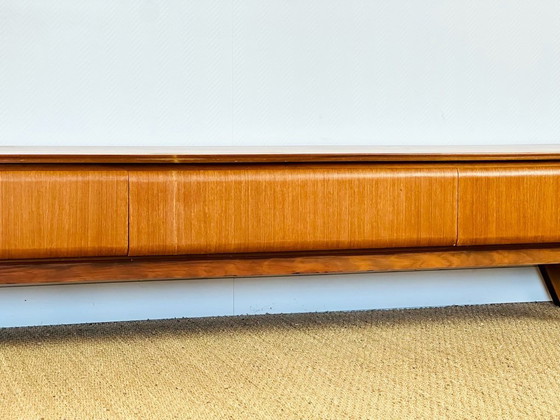 Image 1 of Aparador bajo escandinavo de teca con 3 cajones y patas inclinadas, 1960.