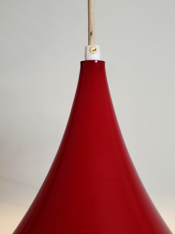 Image 1 of Set of 2 vintage XL semi- or trumpet pendant lamps in deep red