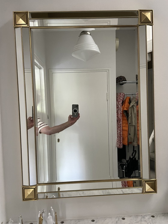 Image 1 of Gold mirror with beveled edge and corner accents