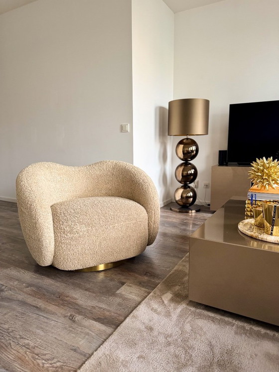 Image 1 of Fauteuil pivotant Eichholtz Diego Canberra Sand