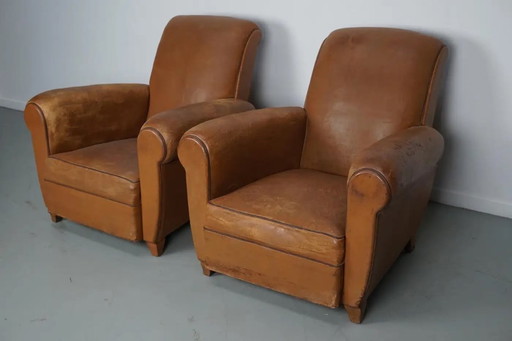Conjunto de sillones de club franceses vintage de cuero color coñac, años 50