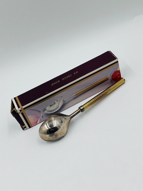 Image 1 of Cuchara para helado de diseño con mango dorado