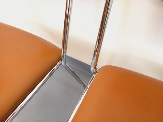 Image 1 of Set di 4 sedie a slitta vintage degli anni '70 in metallo cromato e similpelle color cognac