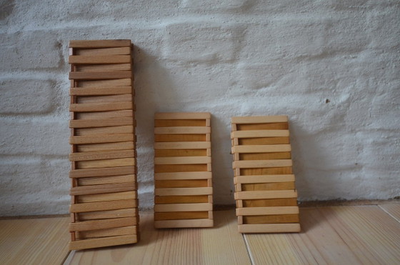 Image 1 of Vintage houten onderzetter, opvouwbaar