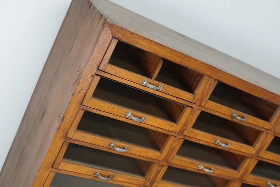 Image 1 of Großer, antiker deutscher Kurzwarenladenschrank aus Eiche, 1940er Jahre