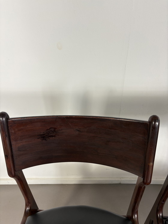 Image 1 of Set off 4 Vintage Palissander Wood With Black skai Leather dining chairs