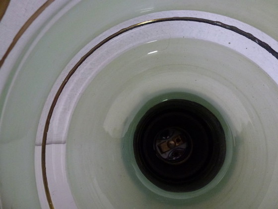 Image 1 of Plafonnier Art Déco, suspension en verre, années 1930, suspension en verre vert clair avec bande dorée, abat-jour pagode.