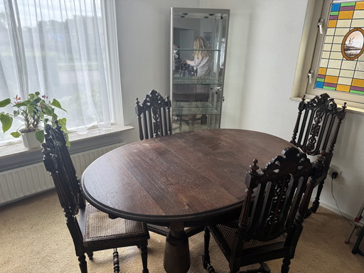 Antique table with matching chairs