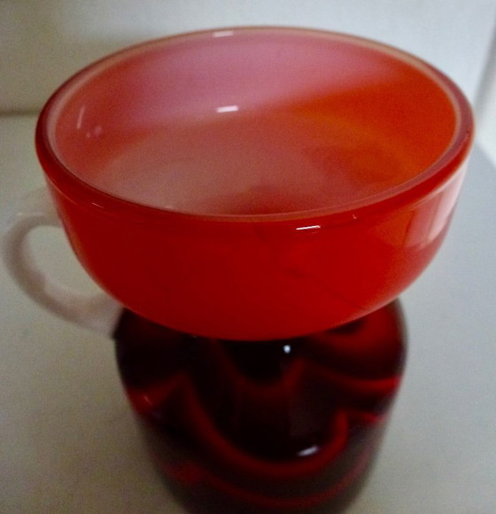 Image 1 of Vintage Murano vase in a wavy pattern with a white handle.