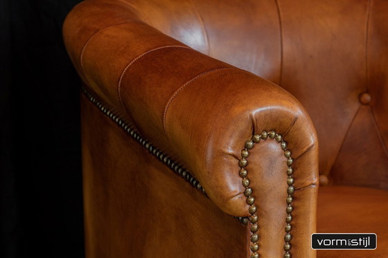 Image 1 of  Gecapitonneerde chesterfield clubfauteuils in het dikste schapenleer