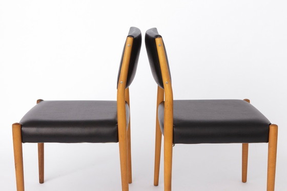 Image 1 of Paire de chaises vintage allemandes, années 1960-1970, en hêtre, revêtement en similicuir noir