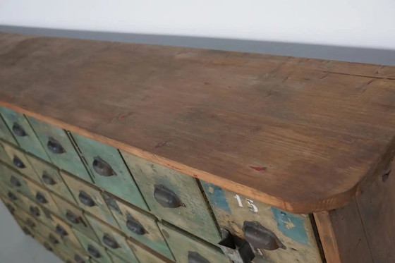 Image 1 of Gran armario industrial francés de madera de pino pintada para guardar artículos de ferretería, década de 1950