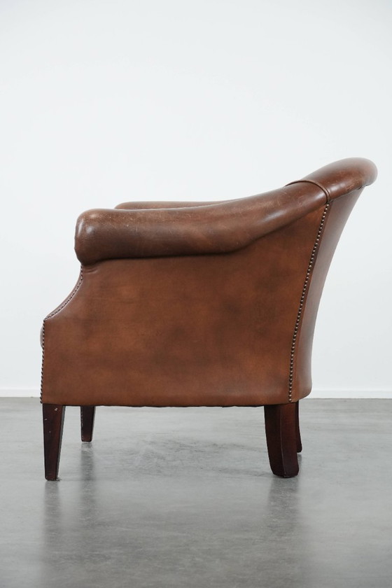 Image 1 of cognac kleurige vintage rundleren clubfauteuil in Engelse stijl 