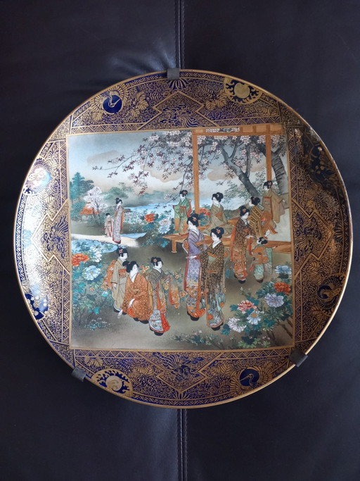 Authentic Japanese Satsuma earthenware decorative plate from the Meiji period 1868-1912