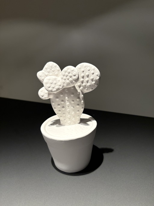 Modern cactus made of rough, white ceramic