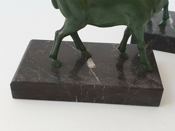 Image 1 of PAIRE DE SERRE-LIVRES BOUQUETINS 1940 1950 VINTAGE EN MARBRE & METAL 40S 50S