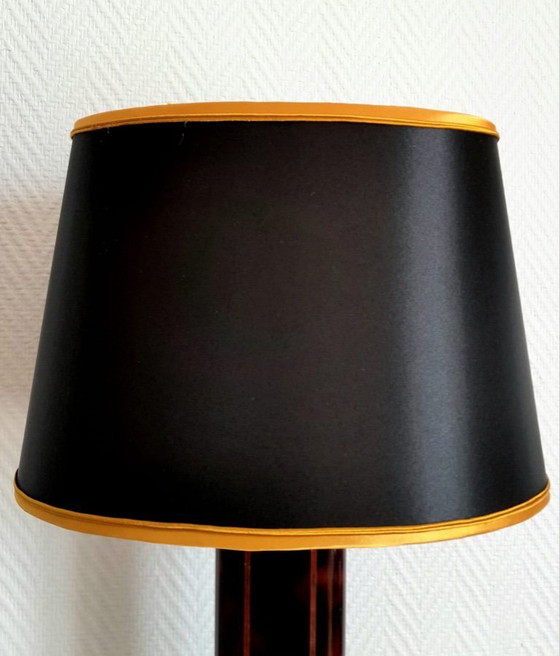 Image 1 of Black and gold Hollywood Regency tortoiseshell lamp